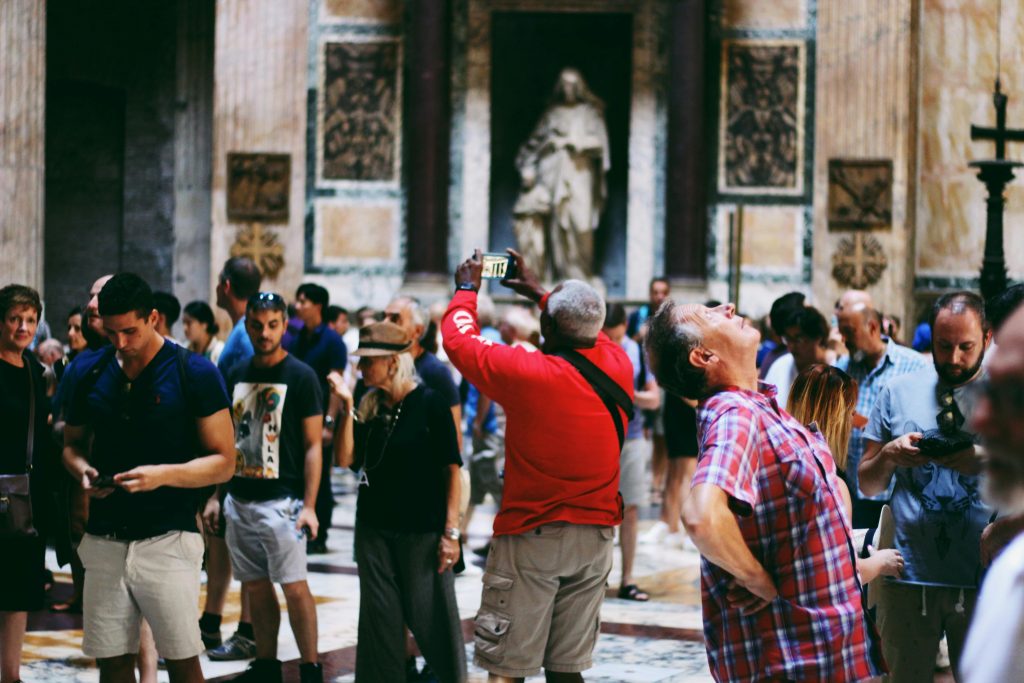 crowded museum no one looking at artifacts