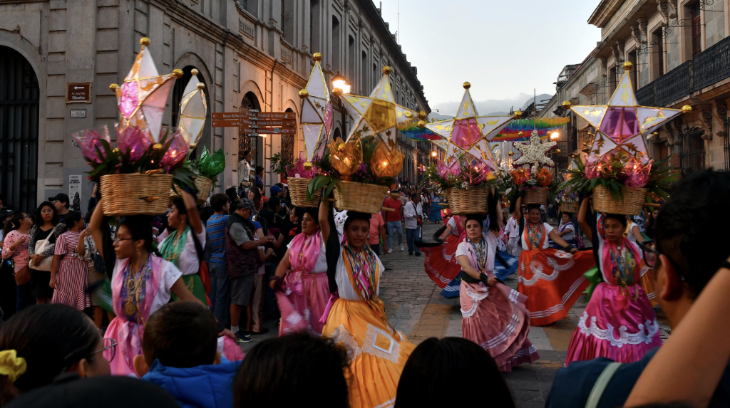 locals, known as Zapotecs, celebrating in the streets of Monte Alban