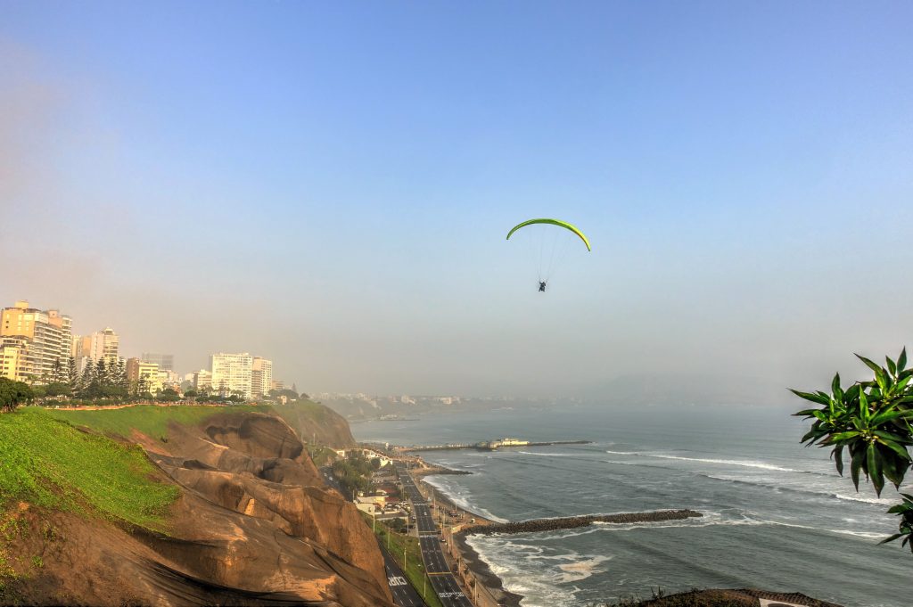 paragliding over the coast of lima peru